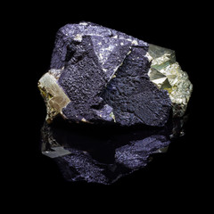 Natural cube pyrite on a black backgrond