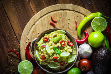 Background Delicious dip avocado paste tomato chilli pepper lime onion garlic dill coriander