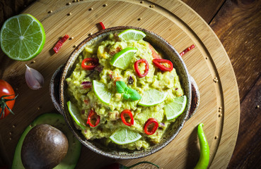 Background Delicious dip avocado paste tomato chilli pepper lime onion garlic dill coriander