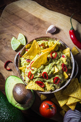 bowl guacamole chips ingredients tomato chilli pepper lime onion garlic dill