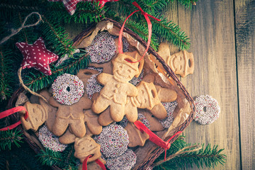 Christmas table basket gingerbreads sweets sprigs spruce place text