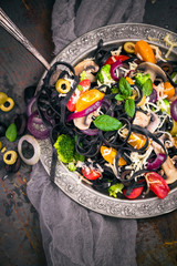 Pasta vegetables rustic table