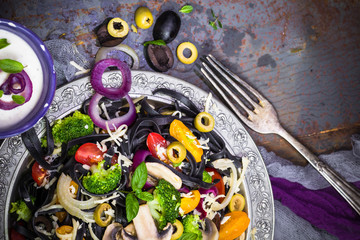 Pasta vegetables rustic table