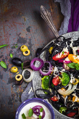 Plate pasta vegetables broccoli mushrooms tomato olives onions chees