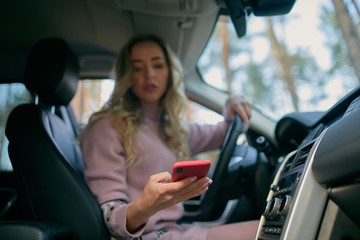The girl in the car with the phone