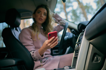 The girl in the car with the phone