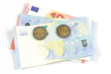 euro banknotes and coins