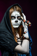 Beautiful halloween portrait and king snake. Dead face.