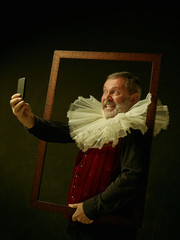 Official portrait of historical governor man with mobile phone from the golden age with corrugated...