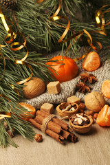 Still life formed with pine branches and New Year sweets