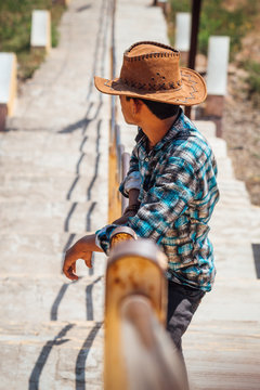 Cowboy in stairs