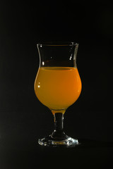 Orange drink in a cocktail glass
