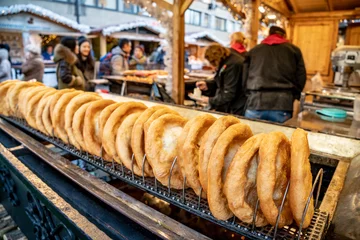 Keuken spatwand met foto Budapest Christmas Market traditional street food called Langos doughnut © Calin Stan