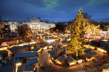 Raamstickers Christmas in Vienna aerial view of the advent market in front of the city hall © Calin Stan