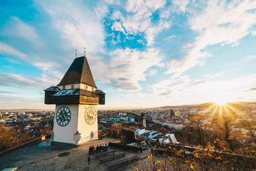 Tuinposter Graz city panorama at sunset from the top of Schlossberg hill © Calin Stan
