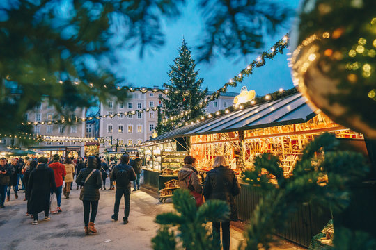 Salzburg Christmas Market seen trough a Christmas tree branches