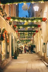 Poster Im Rahmen Salzburg old town city streets decorated for Christmas advent © Calin Stan