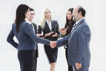 handshake of a businessman and business woman