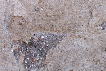 Background - the fragment of a concrete wall.