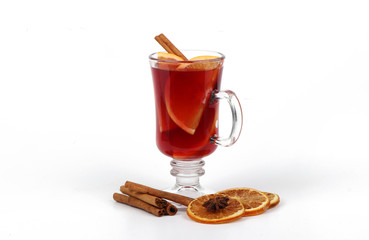 Winter hot drink with spices isolated on white background