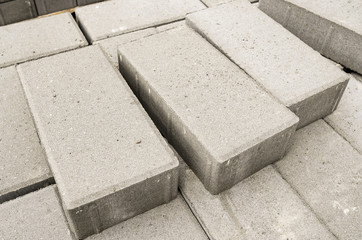 Concrete bricks on pallets for street paving