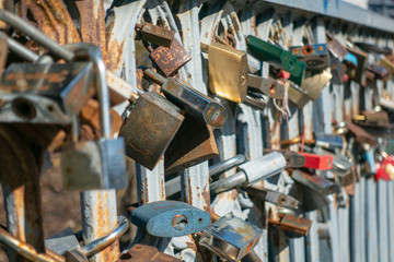 Locks on the fence of the bridge