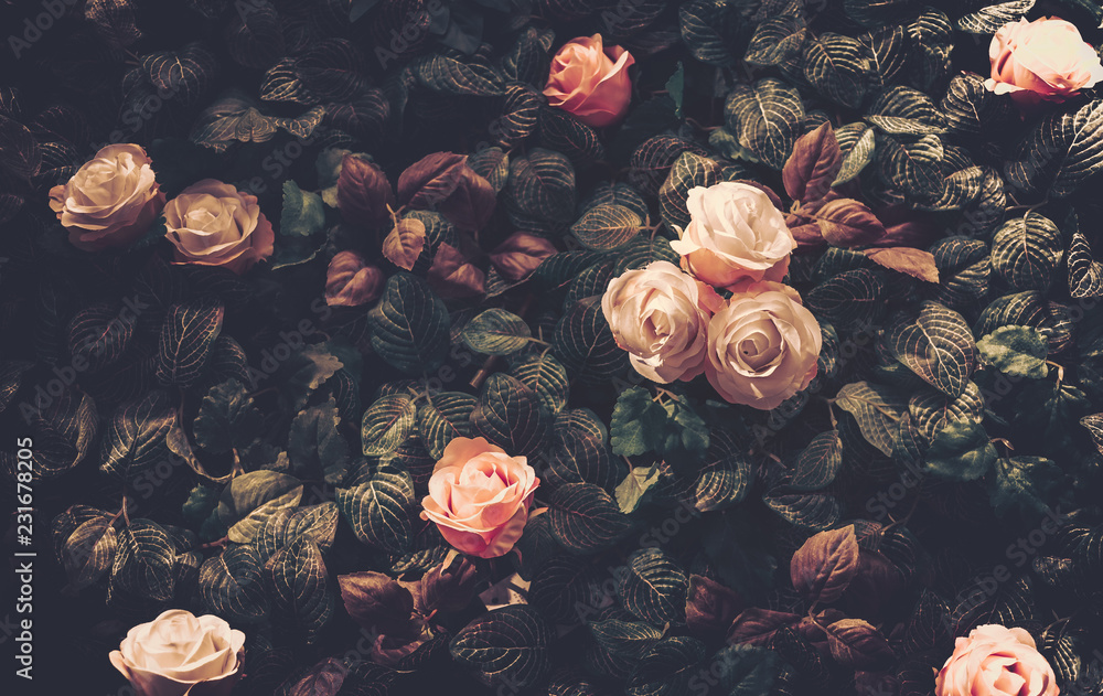 Wall mural artificial flowers wall for background in vintage style