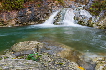 Waterfall and autumn colors. Magic of the Julian pre-Alps.