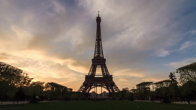 Beautiful 4K UHD timelapse of the Eiffel tower at sunset in spring in Paris, France