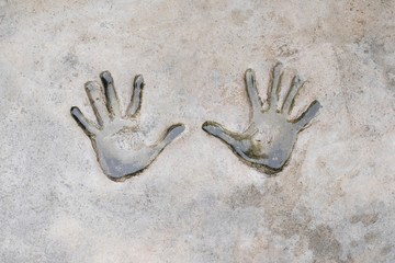 Fingerprints of human on cement. Background and texture of fingerprints. Wet and dirty of fingerprints human on cement.