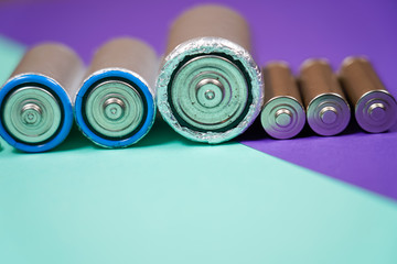 Ecology recycling concept. Many different types used or new battery, rechargeable accumulator,...
