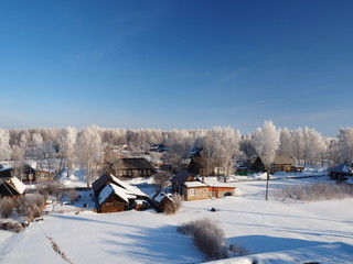 Trees in the frost. Winter snow. Russian small town in winter. Russia, Ural, Perm region