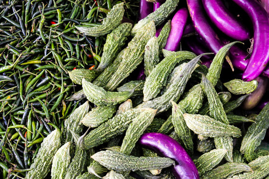 Fresh small Eggplants, Beans and Chillies on a local Farmers Market near Inle Lake, Myanmar