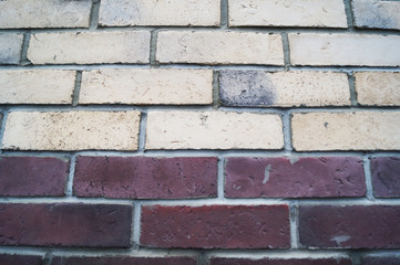Brick two-tone wall, yellow and burgundy