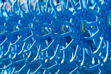 Laconic photo of blue sharp cultivator in the field