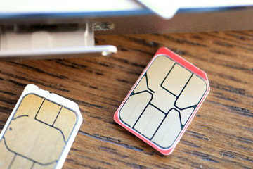 SIM cards on Wooden table