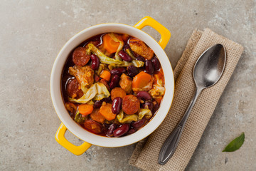 Traditional portuguese goulash with cabbage, beans and ribs.