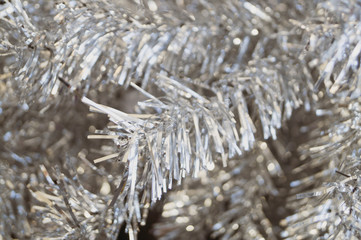 Artificial silver tree close-up. Christmas background