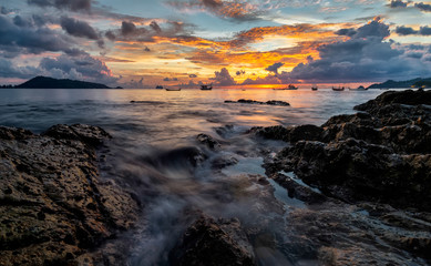 Fototapeta na wymiar Beautiful twilight sky at Kalim Beach Phuket, Thailand.