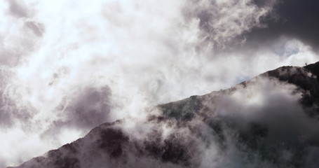 Obraz na płótnie Canvas mountain with cloud on a pacific island, french polynesia