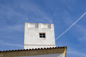 Facades of spanish houses in the white city of Conil de la Frontera on the Costa del luz
