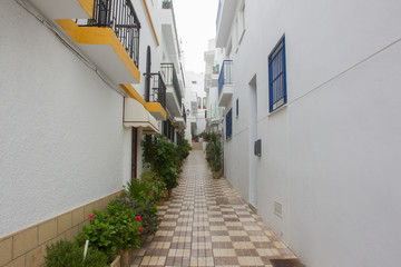 Facades of spanish houses in the white city of Conil de la Frontera on the Costa del luz