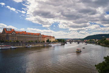 Fototapeta na wymiar Famous Vltava river canal with ships, skyline Czech republic medievil historical landmark