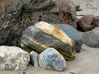 Lot of rocks with different shapes and colors on a beach in Kuujjuaq