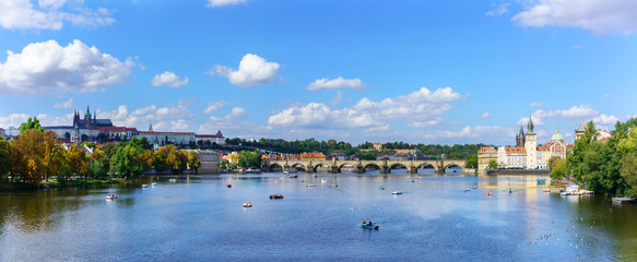 Fototapeta na wymiar Panoramic beautiful scenery cityscape of Prague viewing Prague Castle complex and Charles Bridge crossing Vltava river in the summer , Prague , Czech Republic