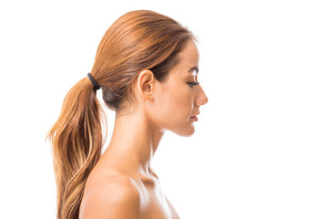 Topless Woman With Ponytail In Studio