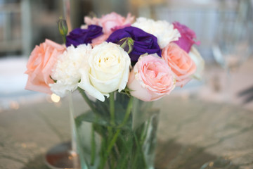 Flower table decorations for wedding dinner.