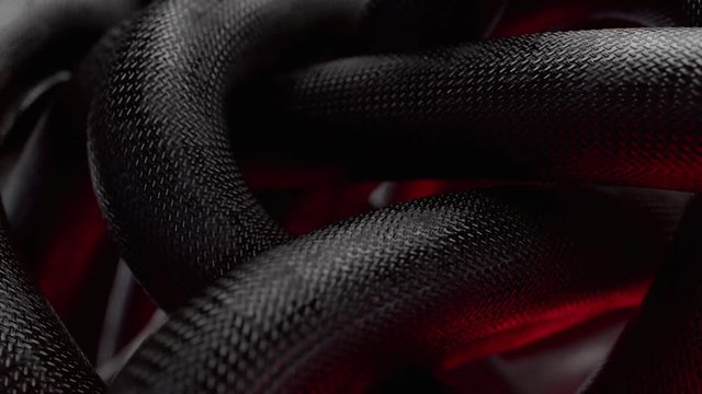 Clew of black wire moving like snake with red light