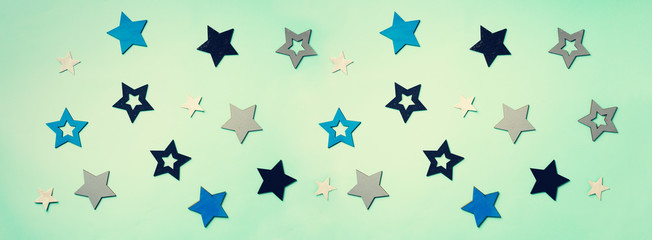 Festive abstract background with blue stars. Texture for new year, birthday, baby shower party. Creative pattern. Banner