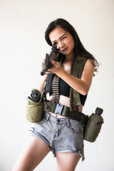 woman in soldier uniform aim rifle gun